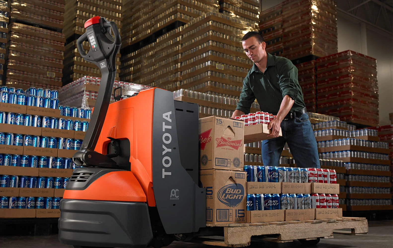 pallet-jacks-and-walkies-in-warehouse-applications-1 Electric Pallet Jacks - Image 1